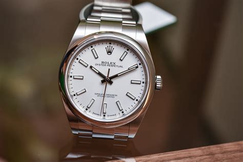 Rolex Oyster Perpetual 114300 White Dial .